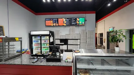 Noni’s Pizza , wings and shawarma